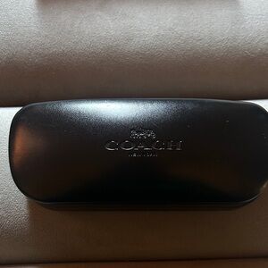 Coach eye glass case.
